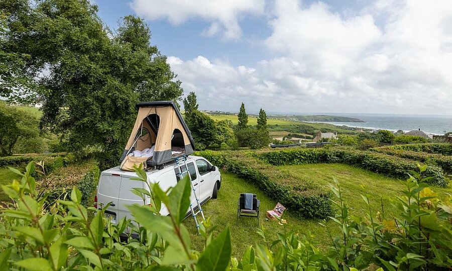 Plaats met zeezicht op camping Le Panoramic nabij Quimper, ideaal voor een verblijf midden in de natuur.